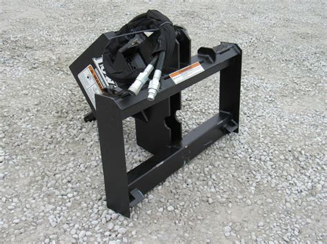 rock digger for skid steer|skid steer hole digger attachment.